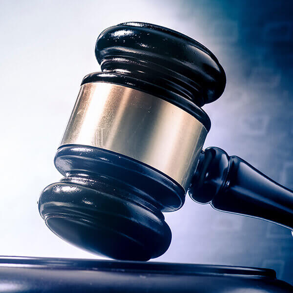 a gavel, representing "the legal system" served by a private investigator - contact us today!