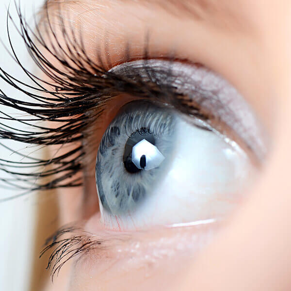 a woman's eye, representing "individuals" served by a private investigator - contact us today!